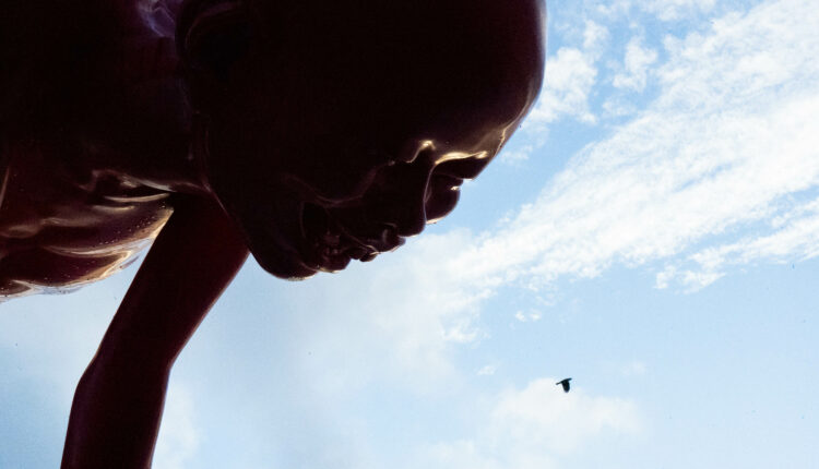 Man statues on Davie St.