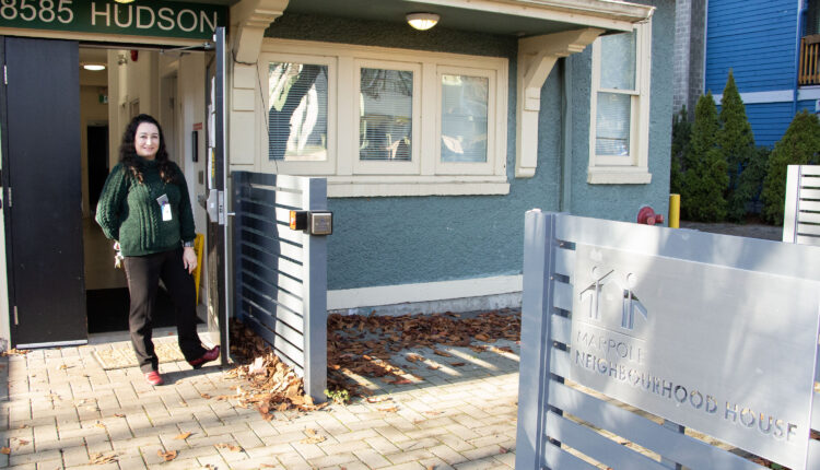 Nilda Borrino, executive director of Marpole Neighbourhood house, standing outside of Marpole Neighbourhood House.