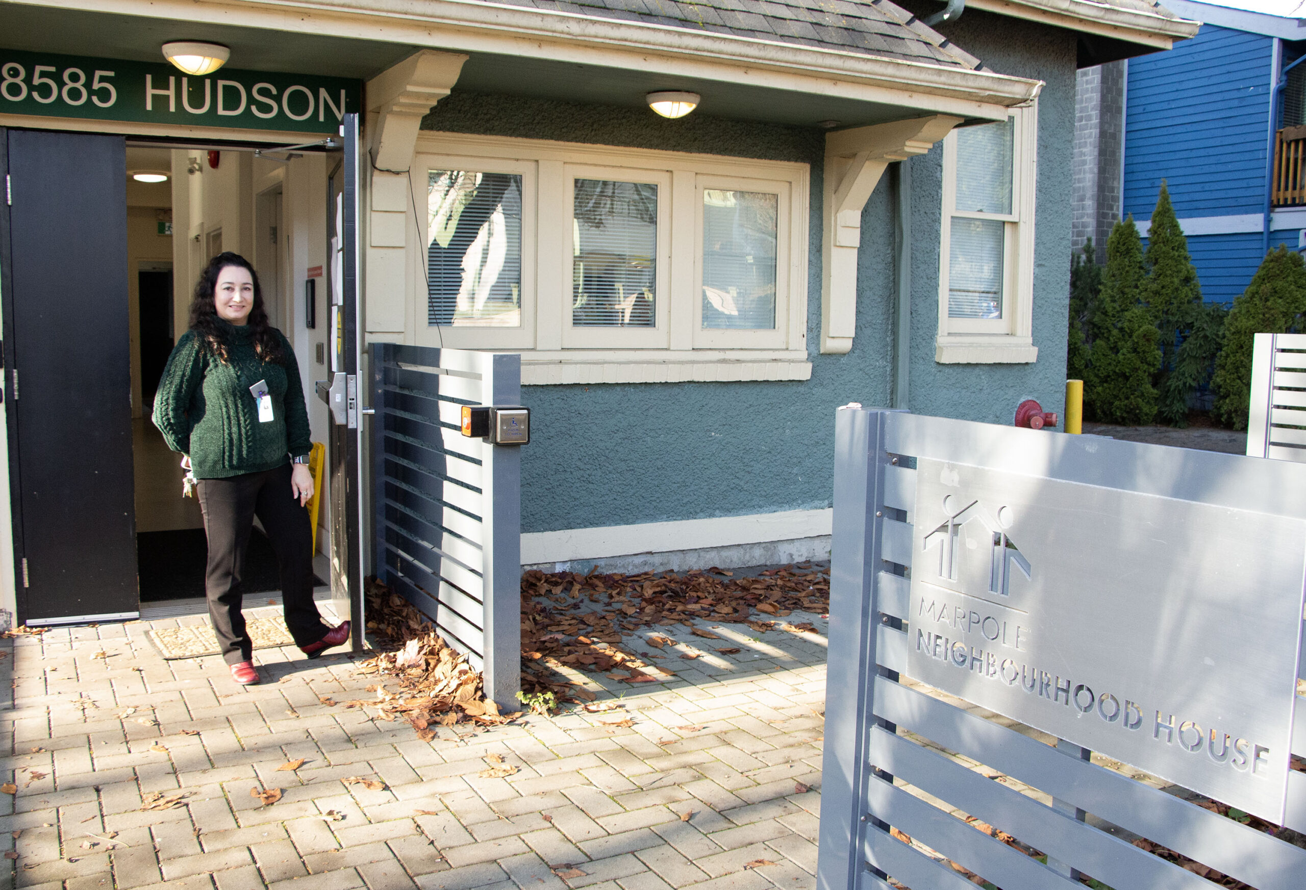 Nilda Borrino, executive director of Marpole Neighbourhood house, standing outside of Marpole Neighbourhood House.