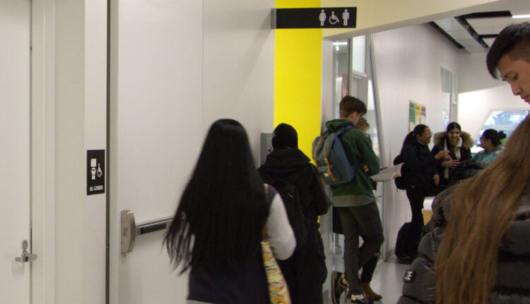 Students outside a washroom.