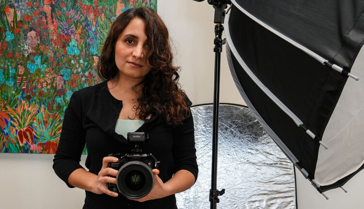 Nina Zarabi posed with her work equipment at the office after an interview with a reporter from Langara Voice in Vancouver, B.C., March 18, 2025. Photo by Philomena Okolo